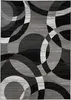A top-down view of a modern geometric rug with abstract circular patterns in shades of black, gray, and white. Voir les images du produit