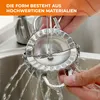 A person is rinsing a stainless steel dumpling maker under running water in a kitchen sink. Produktbild-Vorschau