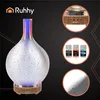 A marketing image for an aroma diffuser, showcasing the product and its accessories. Produktbild-Vorschau