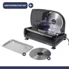 A black electric slicer with a metal tray and a spare blade are displayed on a white background. Produktbild-Vorschau