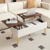 A modern living room scene featuring a white sectional sofa and a walnut-colored lift-top coffee table. Podgląd zdjęcia produktu