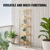 A wooden shelf unit with plants on a balcony. Podgląd zdjęcia produktu