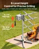 A rotisserie grill is set up outdoors on a patio with a fire burning nearby. Voir les images du produit