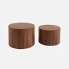Two round wooden side tables of different sizes against a white background. Produktbild-Vorschau