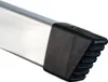 A close-up view of the end of a ladder rail with a black rubber foot. Náhľad obrázku produktu