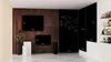 A room with a large blackboard wall, two smaller blackboards on a brown wall, and shelves with decorative items. Anteprima dell’immagine prodotto