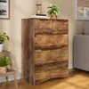 A wooden chest of drawers with decorative items on top, placed in a room setting. Podgląd zdjęcia produktu