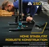 A man performing a push-up on a dip station in a gym setting. Produktbild-Vorschau