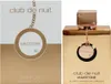 A product shot of a perfume bottle and its packaging. Voir les images du produit