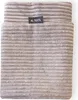A close-up view of a beige corduroy dog bed cover with a black label. Produktbild-Vorschau