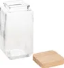 A clear glass jar with a wooden lid, shown on a white background. Náhled obrázku produktu