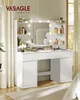 A white vanity table with a mirror and lights, decorated with makeup and accessories. Produktbild-Vorschau