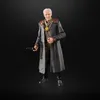 A collectible action figure of The Client from Star Wars The Mandalorian, standing against a black background. Anteprima dell’immagine prodotto