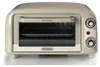 A vintage-style toaster oven is shown from the front on a white background. Náhled obrázku produktu