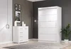 A white sliding door wardrobe and a white chest of drawers are shown in a room with a gray wall and a patterned wall. Produktbild-Vorschau