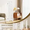 A room divider is shown in a living room setting, with a sofa and a side table. Smaller images below show the product folded in different ways. Anteprima dell’immagine prodotto