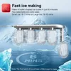 An ice cube maker with ice cubes in a frosty, icy environment with mountains in the background. Náhled obrázku produktu