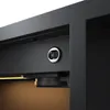A close-up view of a camera lens mounted on a black surface, likely part of a smart mirror or cabinet. Produktbild-Vorschau