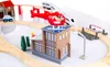 A toy wooden train set with buildings, a helicopter, and a train. Náhled obrázku produktu