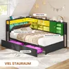 A bed with integrated storage and lighting in a bedroom setting. Voir les images du produit