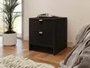 A black nightstand with two drawers and gold handles is placed next to a bed. A plant is in a white pot to the left of the nightstand, and a rug is in the foreground. Náhľad obrázku produktu