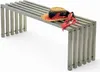 A metal bench with a straw hat and scarf on it, set against a white background. Produktbild-Vorschau