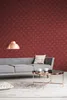 A living room scene with a sofa, coffee table, and a patterned wallpaper. Produktbild-Vorschau