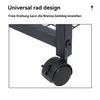 Close-up of a black caster wheel attached to a metal shelf unit. Produktbild-Vorschau