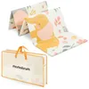 A folded foam play mat with an elephant and floral pattern, shown next to its storage bag. Podgląd zdjęcia produktu