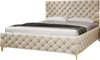 A studio shot of a tufted bed with a mattress and bedding. Produktbild-Vorschau