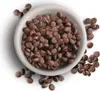 A bowl of dog food with some pieces scattered around it. Produktbild-Vorschau