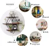 A collage showing a geometric wall shelf and various room settings where it can be used. Produktbild-Vorschau