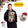 A man holding a Christmas advent calendar for pets, with festive decorations in the background. Produktbild-Vorschau