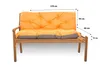 A garden bench cushion on a wooden bench, with dimensions indicated. Produktbild-Vorschau