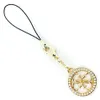 A gold-colored charm with a black cord and a clasp, on a white background. Podgląd zdjęcia produktu