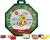 A Christmas advent calendar shaped like an octagon, featuring a Haribo bear character and various Christmas-themed icons. Several small tea light candles are arranged in front of the calendar. Anteprima dell’immagine prodotto