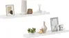 Two white shelves are displayed against a white background, each adorned with decorative items. Produktbild-Vorschau