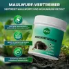 A product container for mole repellent balls is shown in a natural outdoor setting with plants and soil. Produktbild-Vorschau