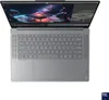 A top-down view of an open silver Lenovo Yoga laptop with its screen displaying a colorful digital art scene and a wireframe model of a piano. The keyboard and trackpad are clearly visible. Anteprima dell’immagine prodotto