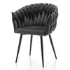 A single, upholstered accent chair with a dark gray velvet finish and black metal legs, set against a plain white background. Podgląd zdjęcia produktu