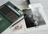 An art set for drawing, including pencils, a blending stump, and an eraser, along with a drawing of a lion and a flashlight. Voir les images du produit