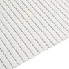 A close-up view of white mosaic tiles. Produktbild-Vorschau