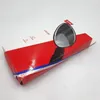 A product box with a mirror partially visible through a cutout. Náhľad obrázku produktu