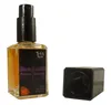 A perfume bottle and its cap are displayed against a white background. Produktbild-Vorschau