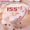 A pink and white gaming chair with an extended footrest, shown in a room setting with a desk and computer monitor in the background. Anteprima dell’immagine prodotto