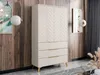 A bedroom scene featuring a wardrobe with drawers and decorative doors, set against a wood-paneled wall with decorative lighting. Náhled obrázku produktu
