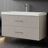 A modern bathroom vanity with a sink and faucet against a dark gray wall. Produktbild-Vorschau