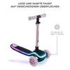 A pink Kinderkraft scooter with LED lights on the deck and wheels, shown against a white background. Podgląd zdjęcia produktu