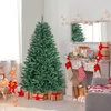 A decorated Christmas tree with presents underneath, a fireplace with stockings, and a lighted reindeer decoration. Voir les images du produit