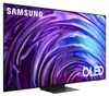 A Samsung OLED television with a vibrant, abstract wallpaper displayed on its screen, set against a black background. Náhled obrázku produktu